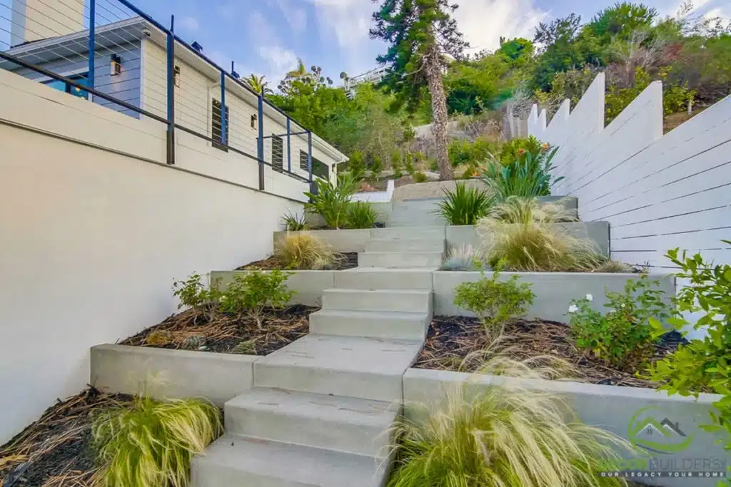 Hillside staircase with landscaping in a custom home design and build in Hillsborough, CA