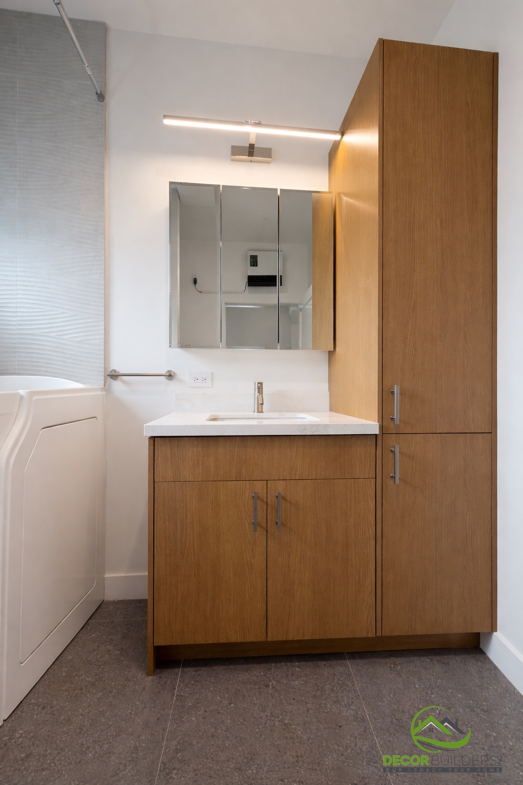 Bathroom remodeling with wood vanity tower, undermount sink, and lighted medicine cabinet, Sunnyvale CA