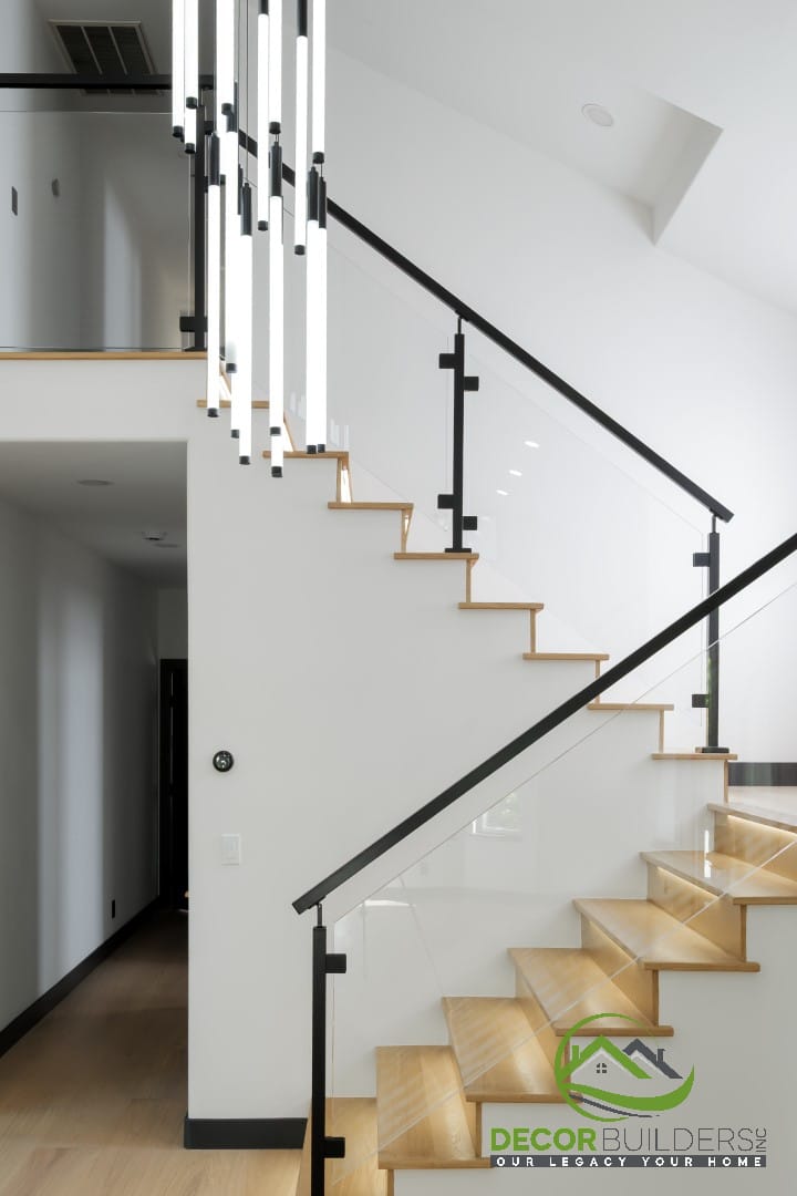 Modern staircase with wood treads and black metal railing, a feature of custom home construction in Campbell, CA