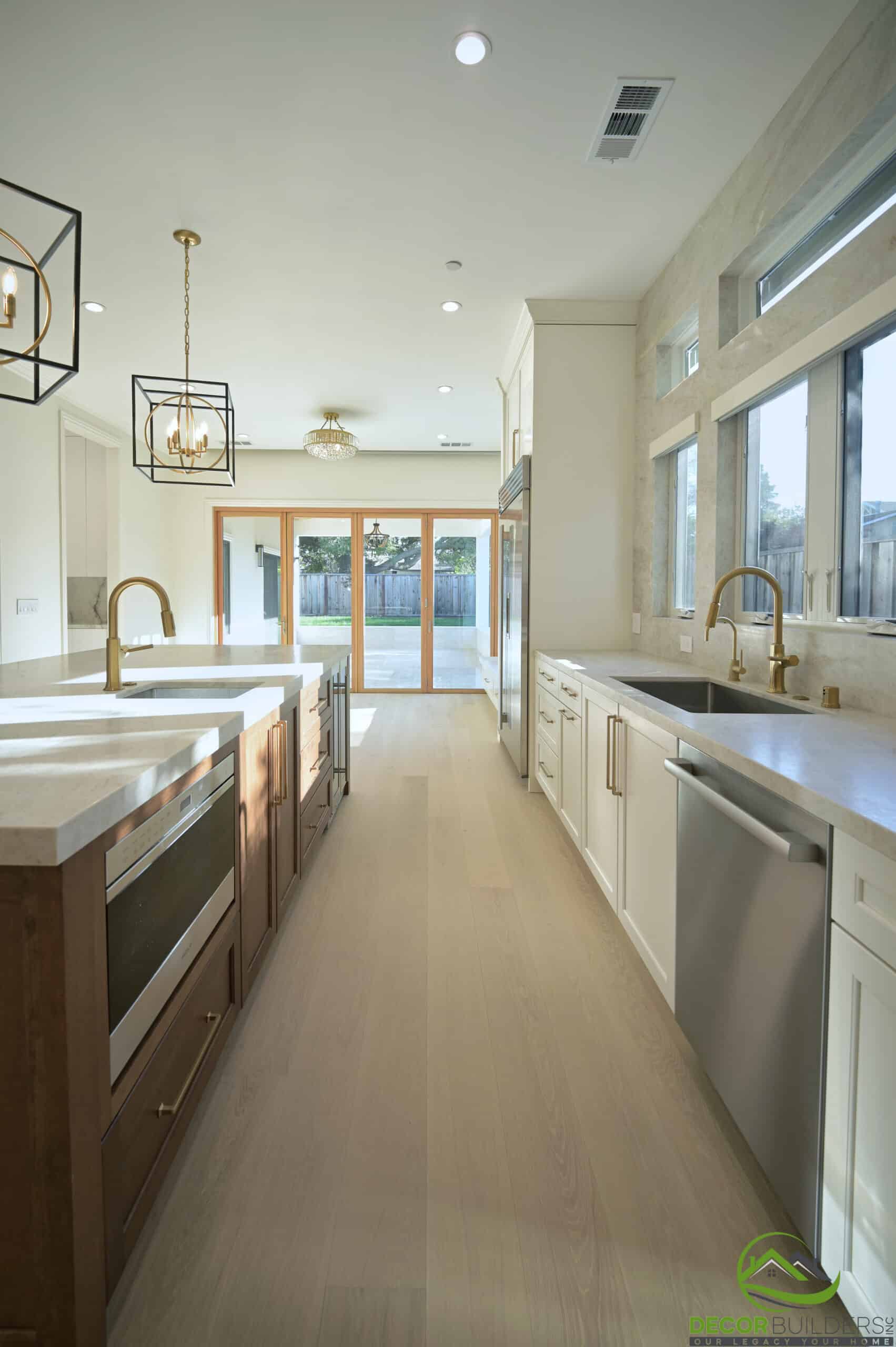 Kitchen island with built-in sink and dishwasher, part of a kitchen renovation in Cupertino, CA