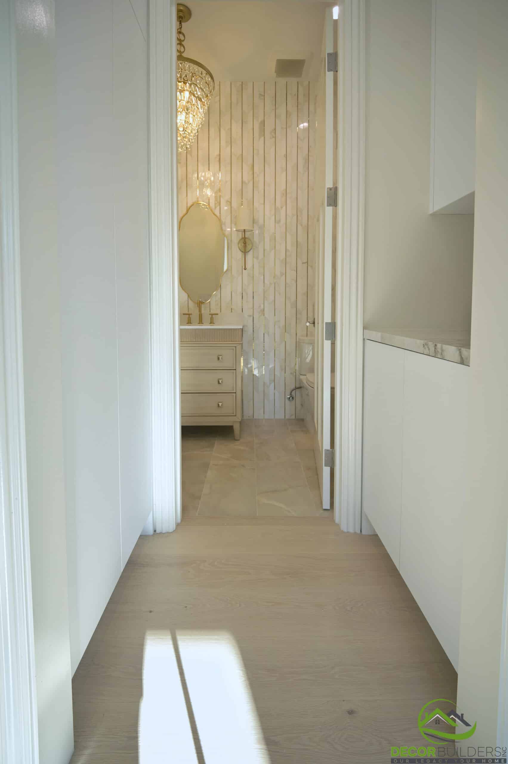 Renovated hallway with hardwood flooring and wall mirror in Cupertino, CA