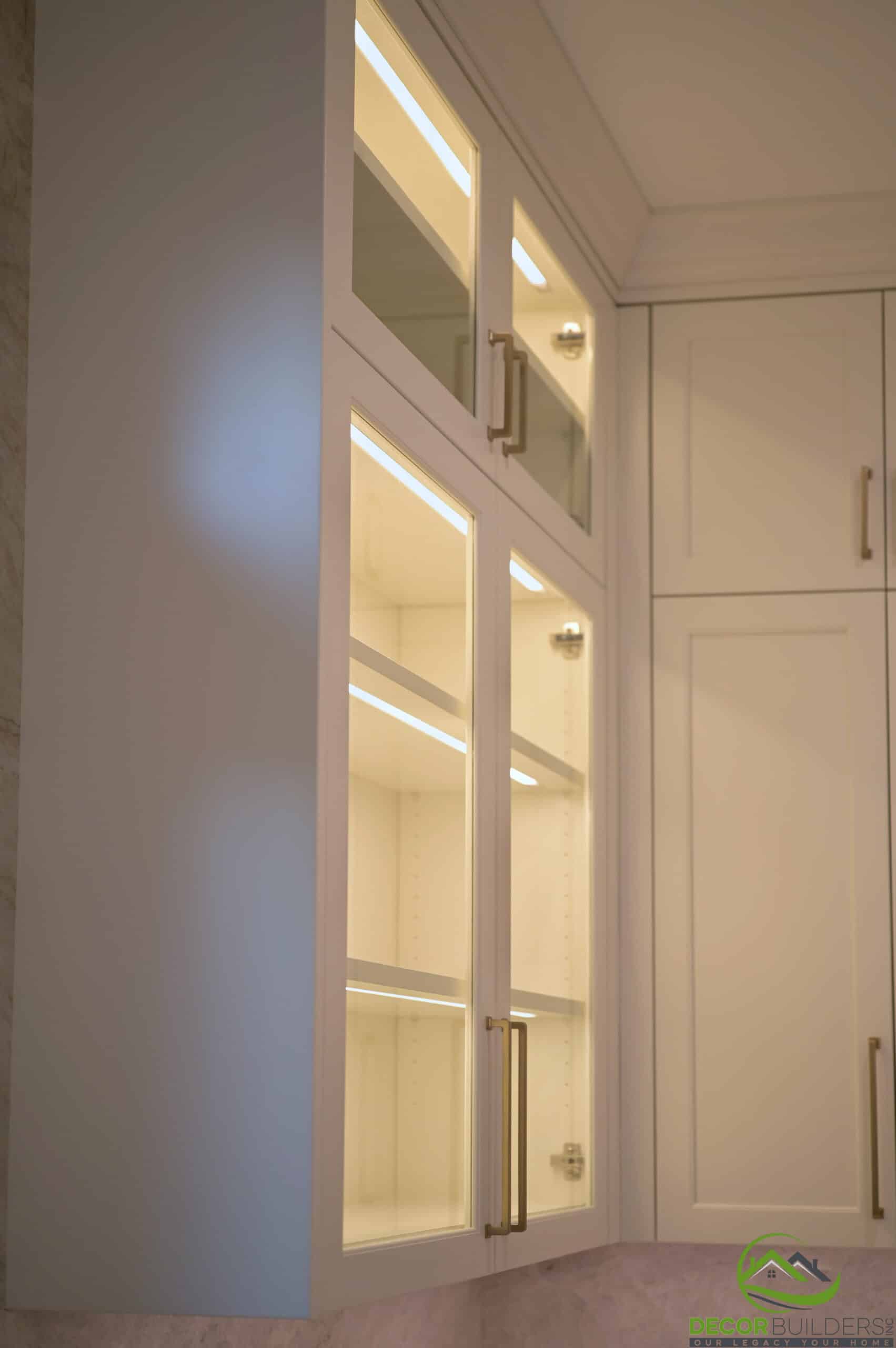 Illuminated built-in glass display cabinet, a custom feature from a home renovation in Cupertino, CA