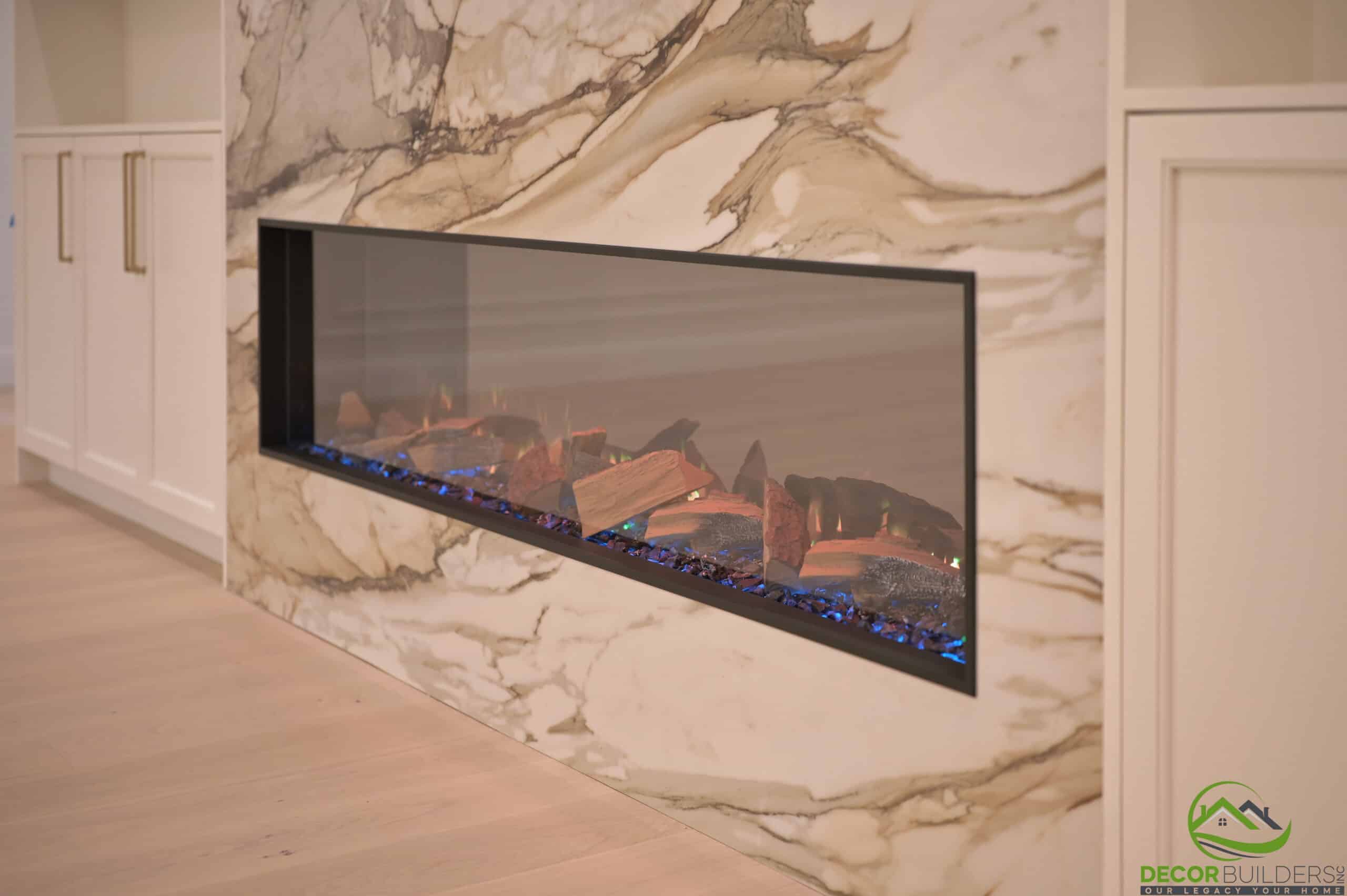Modern linear fireplace with marble surround, a feature of a custom home remodeling project in Cupertino, CA