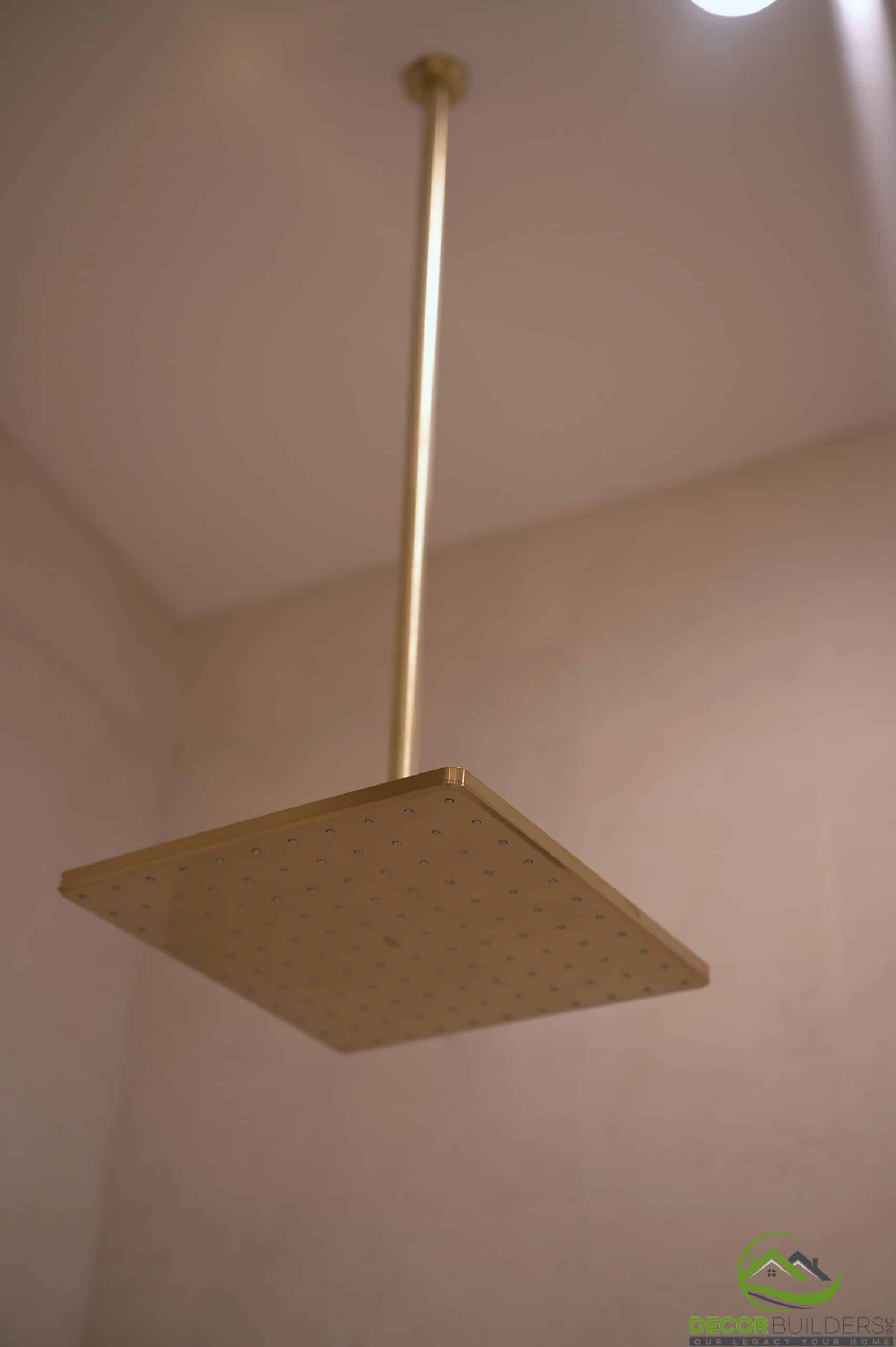Square brass rain shower head, a feature of a bathroom remodel in Cupertino, CA