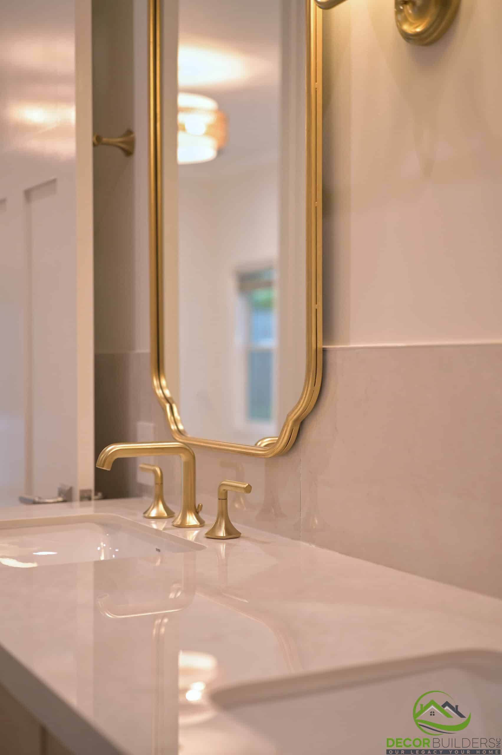 Long double vanity with wood cabinetry and brass fixtures from a bathroom renovation in Cupertino, CA