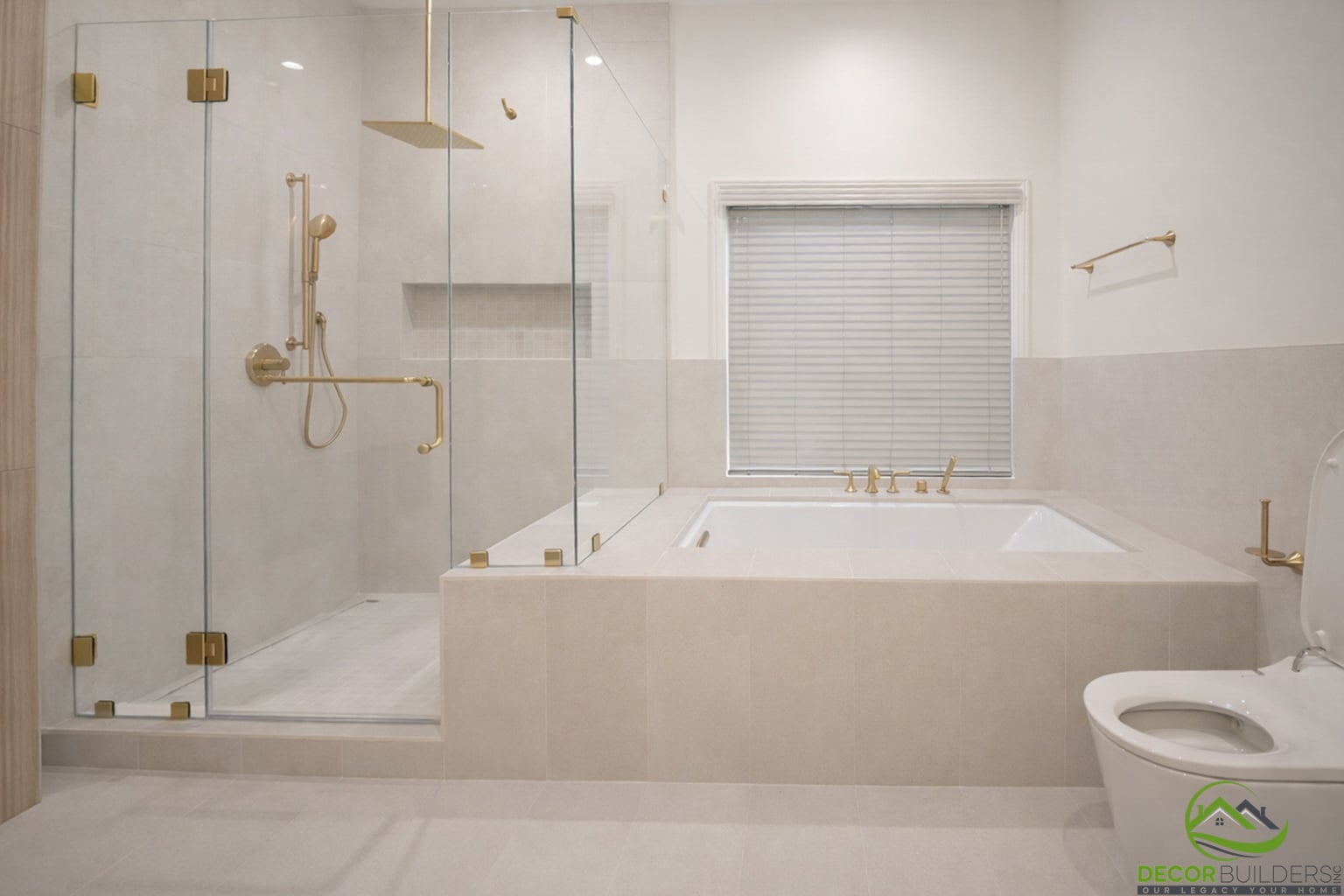 Bathroom with soaking tub and glass shower enclosure featuring brass hardware, a bathroom remodeling project in Cupertino, CA