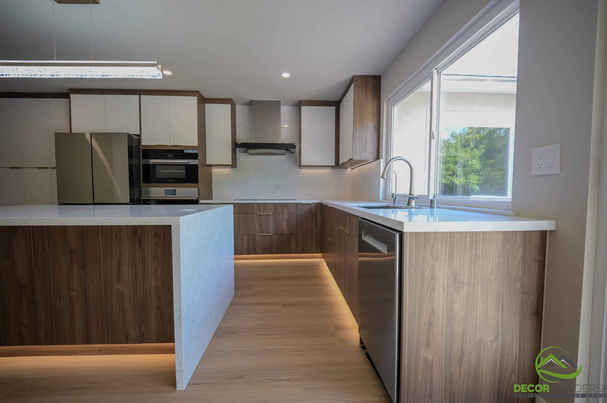 Kitchen remodel with quartz island, wood cabinetry, stainless appliances, and LED under-cabinet lighting, Foster City CA