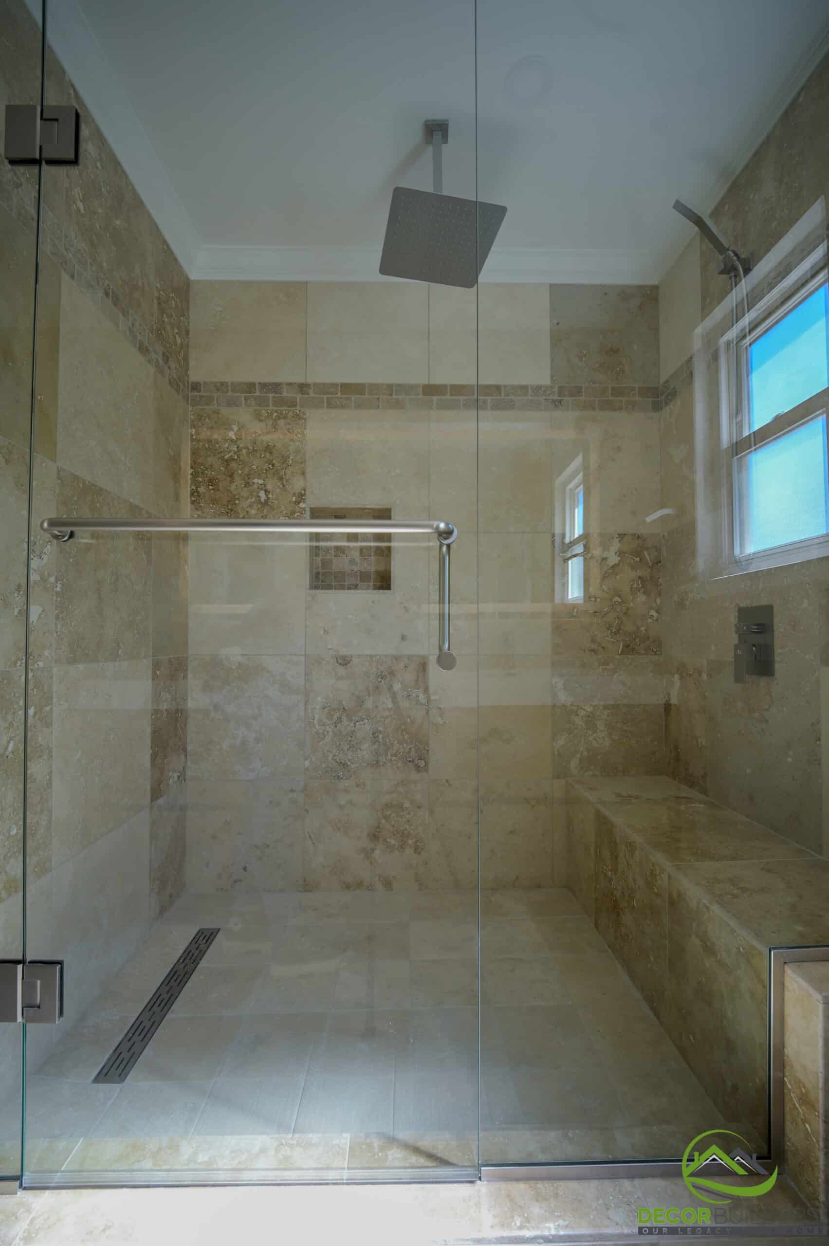 Custom home bathroom walk-in shower with travertine stone tile, ceiling rain head, and linear drain, Foster City CA