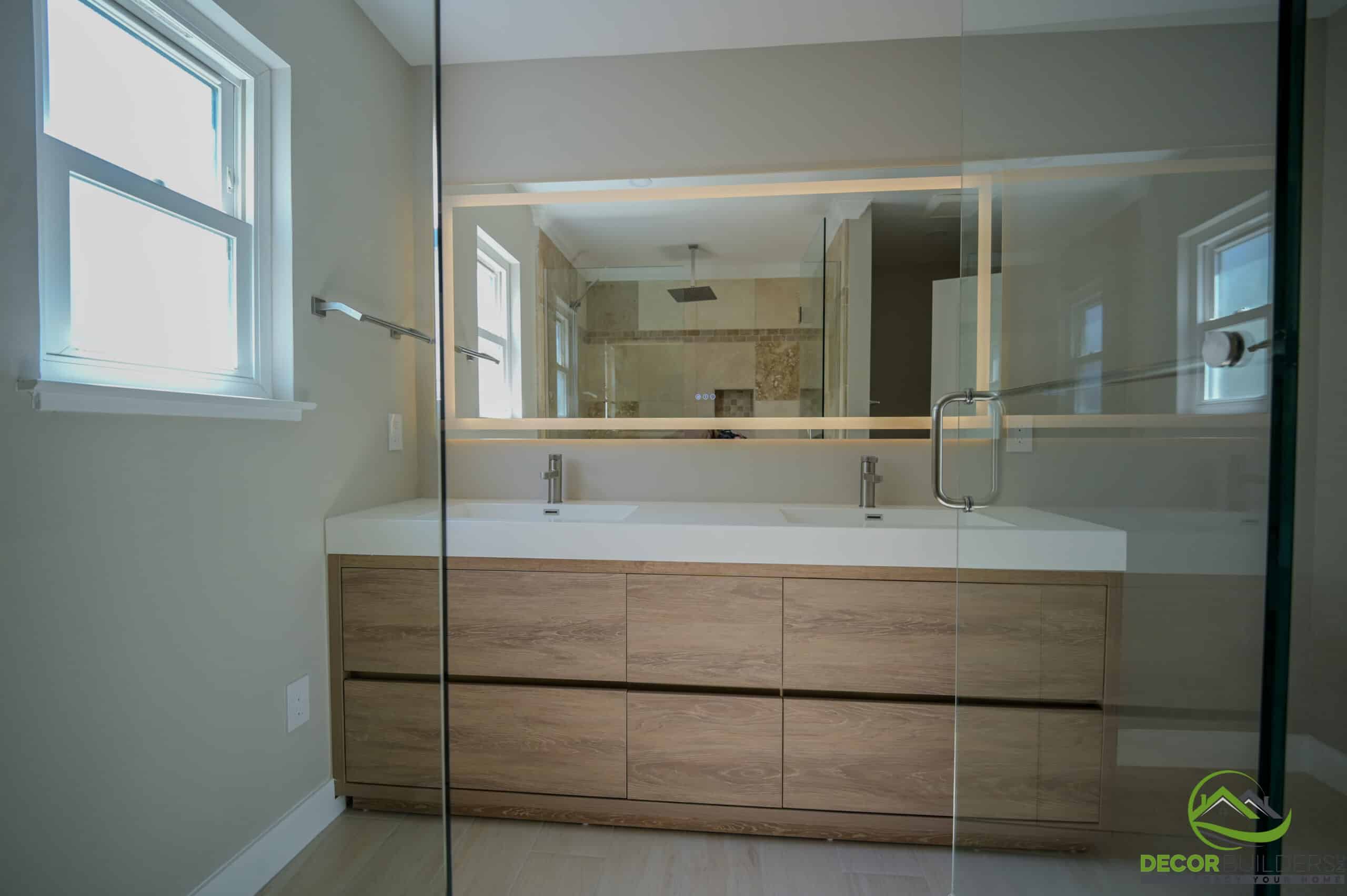 Custom home master bathroom with floating wood vanity, double sinks, LED mirror, and glass shower, Foster City CA