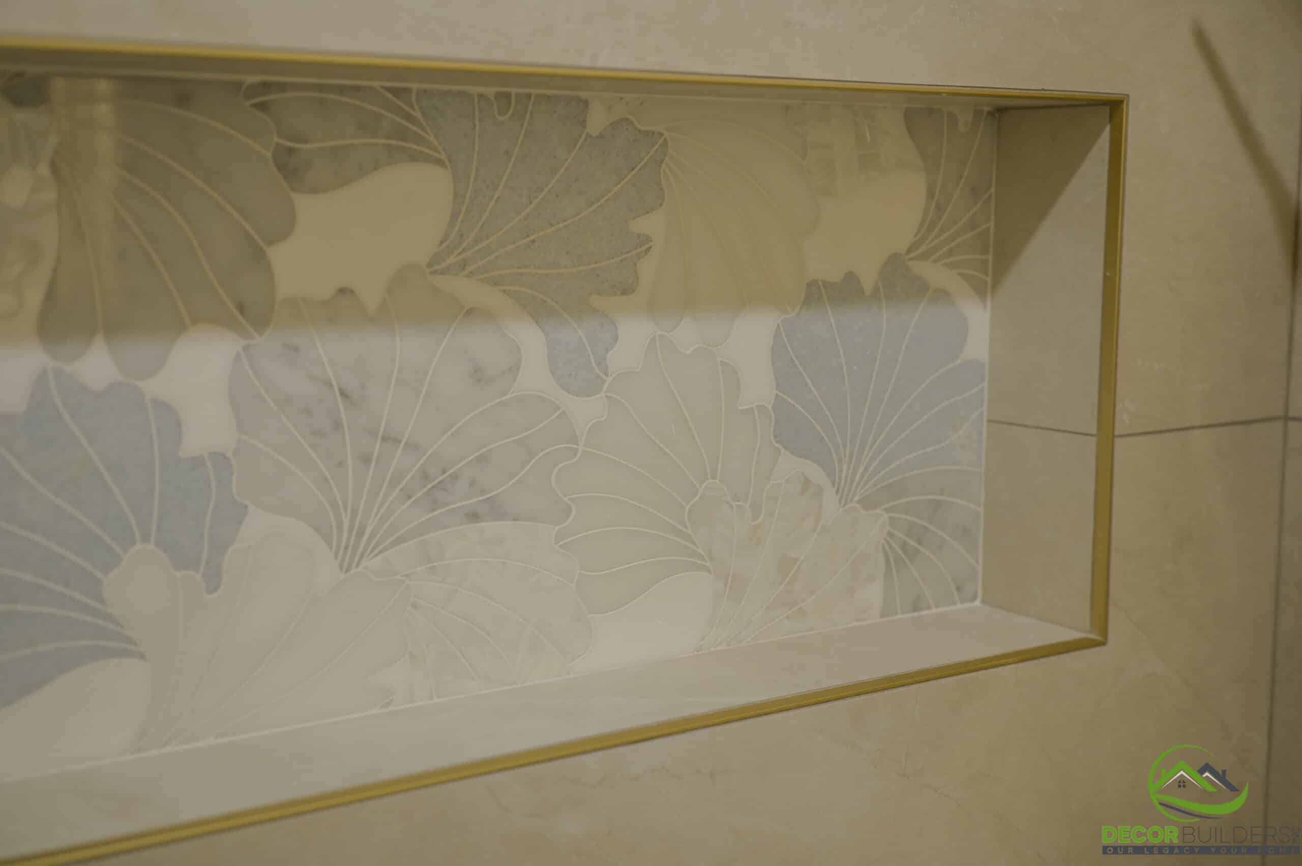 Bath remodel shower niche with floral mosaic tile and gold trim detail, Foster City CA